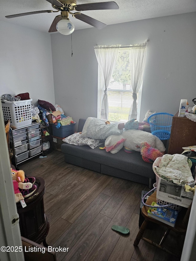100 Monroe St, Radcliff, KY 40160 - bedroom featuring wood finished floors, ceiling fan, and a textured ceiling