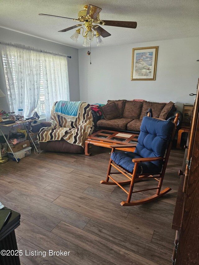 100 Monroe St, Radcliff, KY 40160 - living room with a ceiling fan, wood finished floors, and a textured ceiling