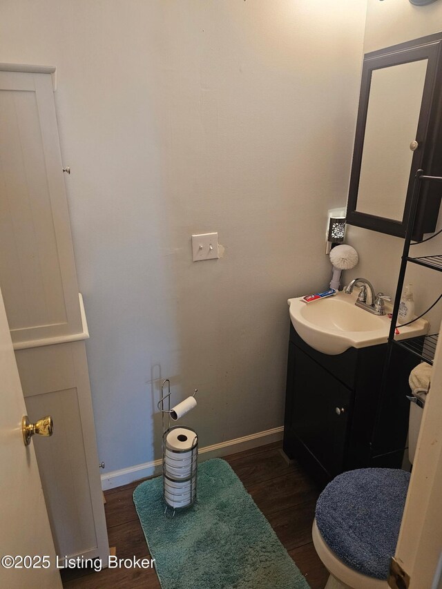 100 Monroe St, Radcliff, KY 40160 - half bath with vanity and wood finished floors