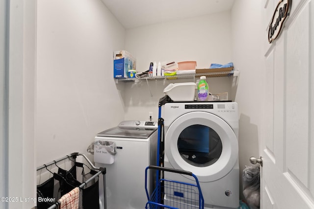 laundry area with separate washer and dryer