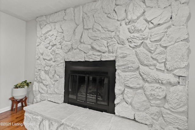 3304 S Camden Ln, Crestwood, KY 40014 - detailed view of a stone fireplace, wood finished floors, and baseboards