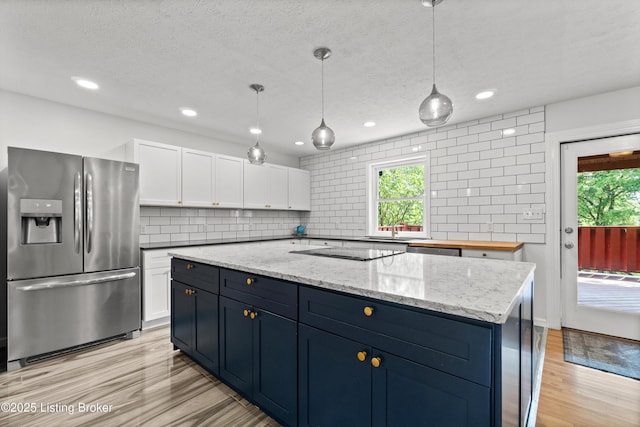 3304 S Camden Ln, Crestwood, KY 40014 - kitchen with stainless steel appliances, healthy amount of natural light, white cabinetry, tasteful backsplash, and recessed lighting