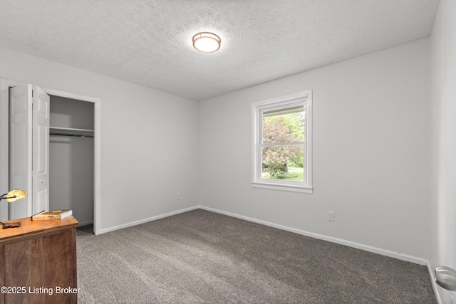 3304 S Camden Ln, Crestwood, KY 40014 - unfurnished bedroom with carpet floors, baseboards, a closet, and a textured ceiling