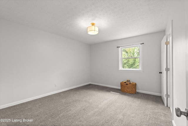 3304 S Camden Ln, Crestwood, KY 40014 - carpeted spare room with baseboards and a textured ceiling