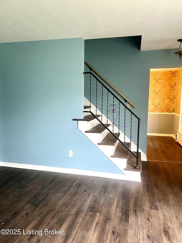 2227 Bradford Dr, Louisville, KY 40218 - stairway with wood finished floors and baseboards