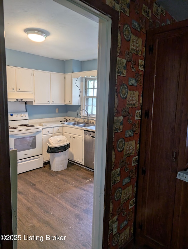 2227 Bradford Dr, Louisville, KY 40218 - kitchen with electric range, stainless steel dishwasher, white cabinetry, and dark wood-type flooring