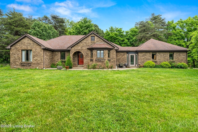 1093 W Bryan Rd, Elizabethtown, KY 42701 - view of front of property featuring brick siding, a front lawn, and roof with shingles