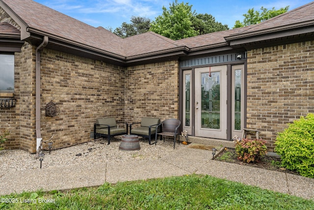 1093 W Bryan Rd, Elizabethtown, KY 42701 - entrance to property featuring brick siding, a patio, and a shingled roof