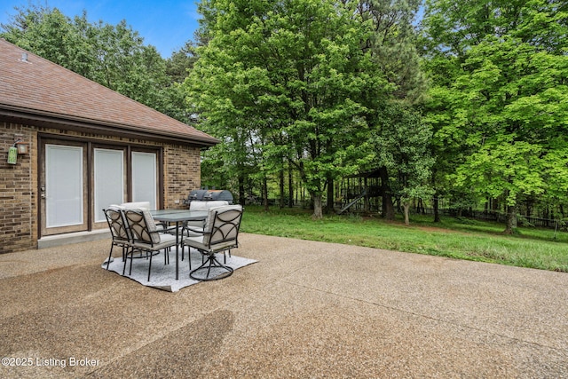 1093 W Bryan Rd, Elizabethtown, KY 42701 - view of patio / terrace featuring outdoor dining area and view of scattered trees