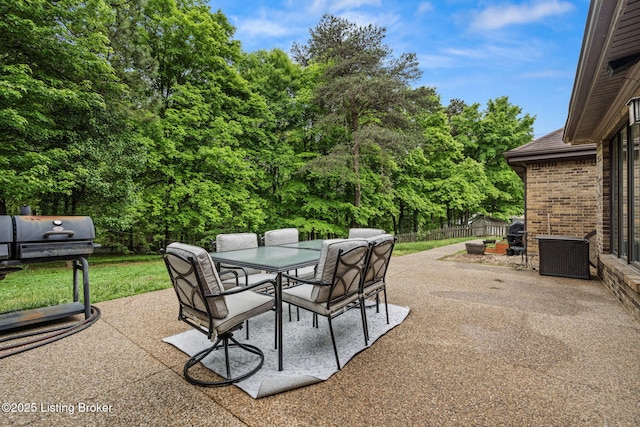 1093 W Bryan Rd, Elizabethtown, KY 42701 - view of patio / terrace with outdoor dining space and fence