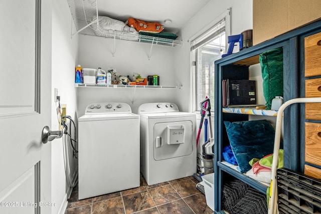 1093 W Bryan Rd, Elizabethtown, KY 42701 - laundry area featuring washing machine and dryer and dark stone finish floors