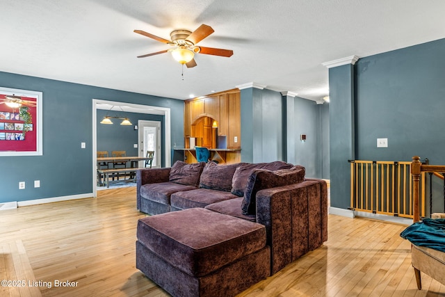 1093 W Bryan Rd, Elizabethtown, KY 42701 - living room featuring ceiling fan, light wood-type flooring, and baseboards