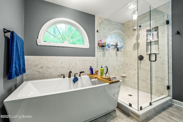 1093 W Bryan Rd, Elizabethtown, KY 42701 - bathroom featuring a shower stall and a freestanding tub