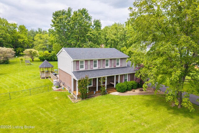 7003 Red Plum Ter, Pewee Valley, KY 40056 - colonial inspired home featuring a porch, a shingled roof, a chimney, and brick siding