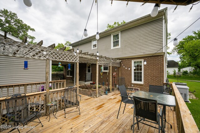7003 Red Plum Ter, Pewee Valley, KY 40056 - wooden deck with outdoor dining space and a pergola