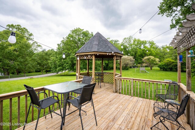7003 Red Plum Ter, Pewee Valley, KY 40056 - wooden deck with a gazebo, outdoor dining space, and view of scattered trees