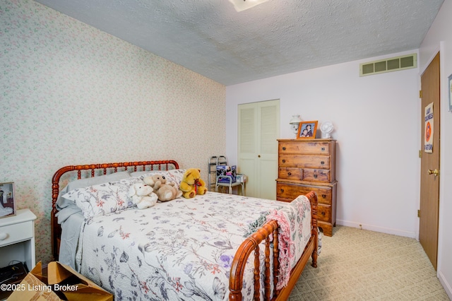 7003 Red Plum Ter, Pewee Valley, KY 40056 - carpeted bedroom with wallpapered walls, baseboards, a closet, and a textured ceiling