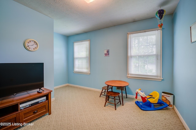 7003 Red Plum Ter, Pewee Valley, KY 40056 - game room featuring carpet, baseboards, and a textured ceiling
