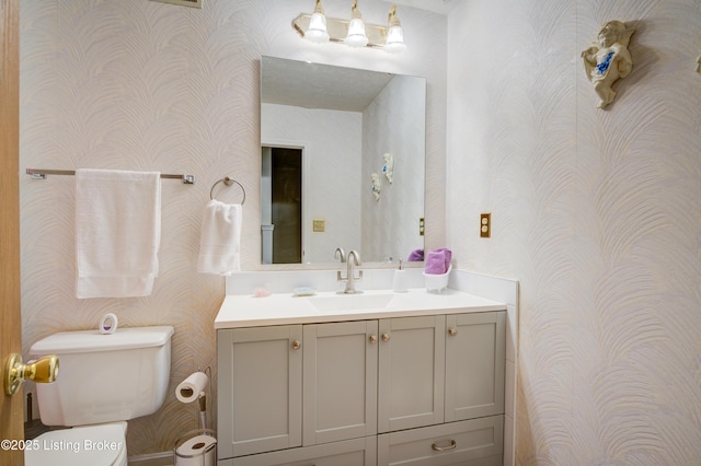 7003 Red Plum Ter, Pewee Valley, KY 40056 - bathroom with wallpapered walls, vanity, and toilet
