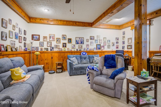 7003 Red Plum Ter, Pewee Valley, KY 40056 - carpeted living area with a textured ceiling, a wainscoted wall, wood walls, a ceiling fan, and a desk