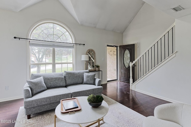 12627 Bay Tree Way, Louisville, KY 40245 - living room featuring wood finished floors, stairway, baseboards, and high vaulted ceiling