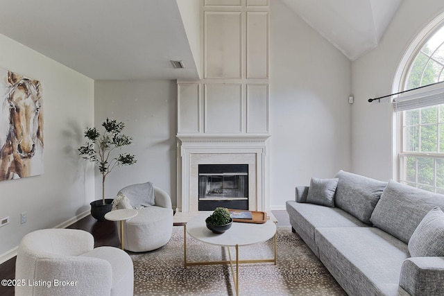 12627 Bay Tree Way, Louisville, KY 40245 - living room with a premium fireplace, lofted ceiling, baseboards, and wood finished floors