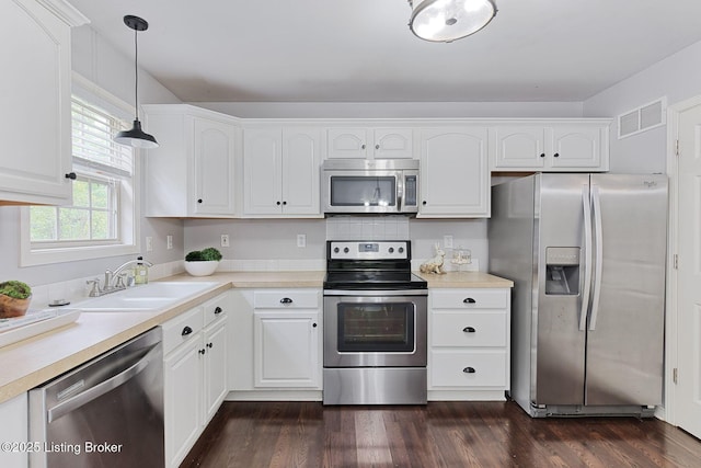 12627 Bay Tree Way, Louisville, KY 40245 - kitchen with stainless steel appliances, a sink, and white cabinets