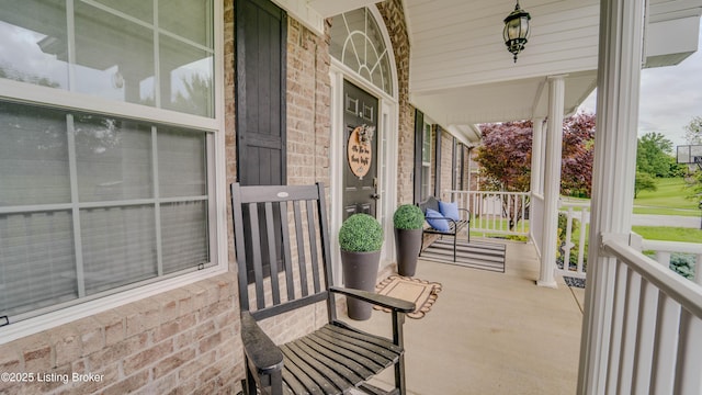116 N Howard St, Bardstown, KY 40004 - view of patio featuring covered porch