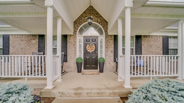116 N Howard St, Bardstown, KY 40004 - property entrance with covered porch and brick siding