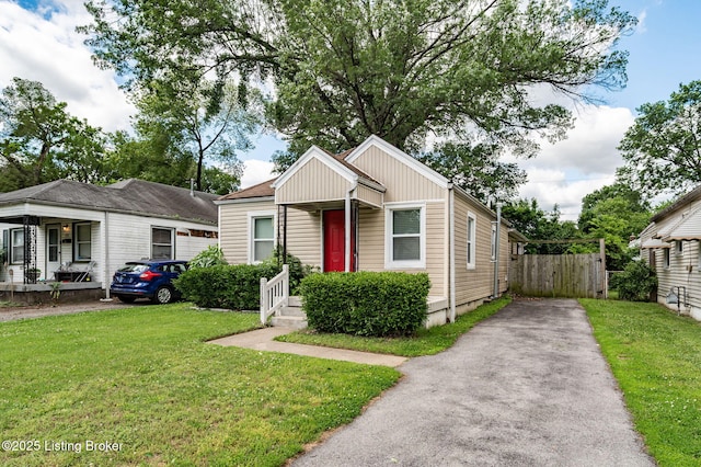 1136 Euclid Ave, Louisville, KY 40208 - view of front of property featuring driveway and board and batten siding