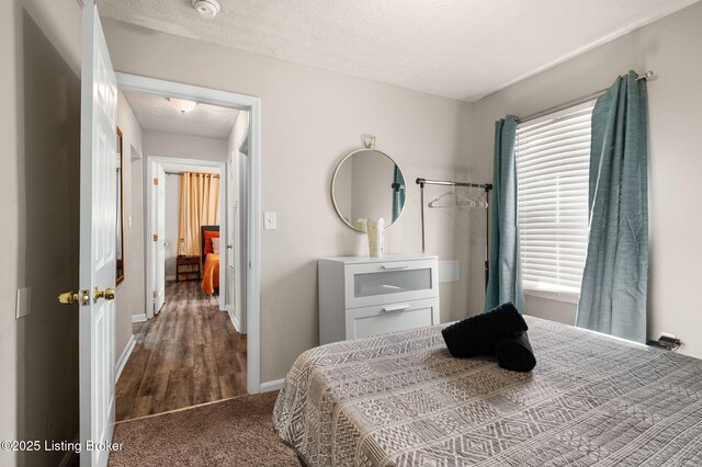 1136 Euclid Ave, Louisville, KY 40208 - carpeted bedroom with baseboards and a textured ceiling