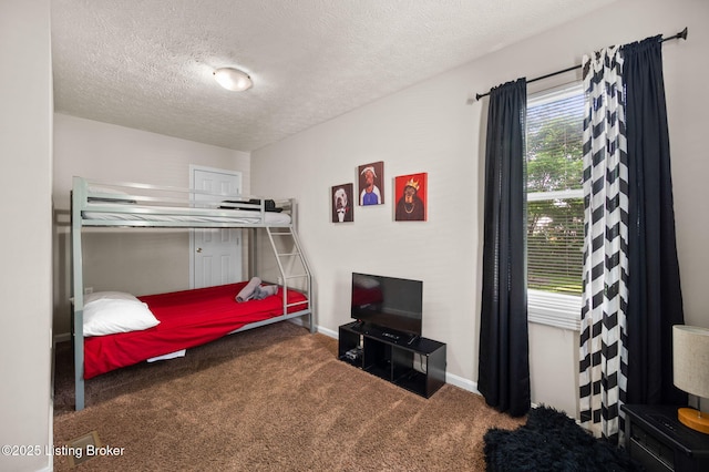 1136 Euclid Ave, Louisville, KY 40208 - bedroom with carpet floors, a textured ceiling, and baseboards