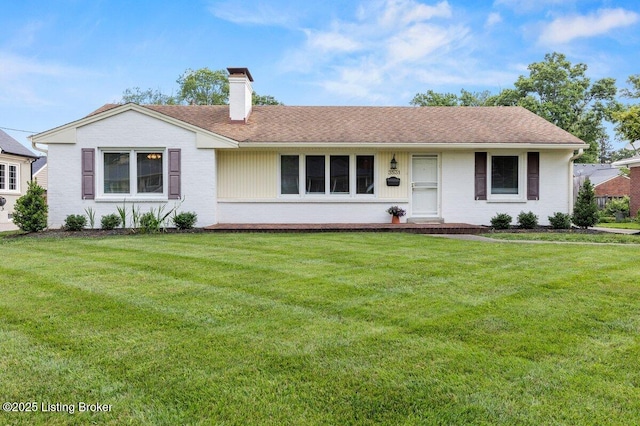 3531 Graham Rd, Louisville, KY 40207 - ranch-style home featuring brick siding, a chimney, a front lawn, and roof with shingles