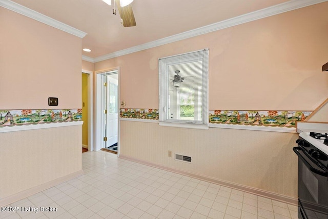 3531 Graham Rd, Louisville, KY 40207 - kitchen with black stove, wainscoting, crown molding, and ceiling fan