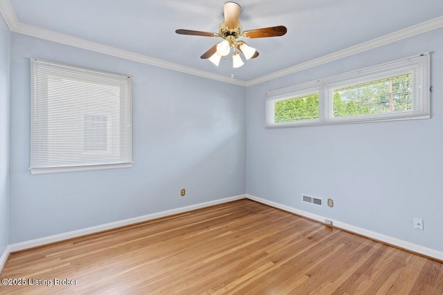 3531 Graham Rd, Louisville, KY 40207 - spare room featuring light wood finished floors, ceiling fan, and ornamental molding