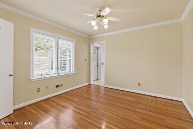 3531 Graham Rd, Louisville, KY 40207 - unfurnished room featuring light wood-type flooring, ornamental molding, and a ceiling fan