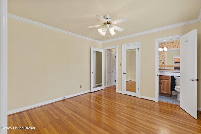 3531 Graham Rd, Louisville, KY 40207 - unfurnished bedroom with light wood finished floors, crown molding, and connected bathroom