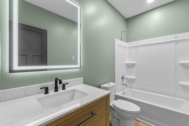 530-532 E Burnett Ave, Louisville, KY 40217 - bathroom with toilet, vanity, shower / tub combination, and wood finished floors
