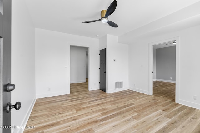 530-532 E Burnett Ave, Louisville, KY 40217 - unfurnished bedroom featuring light wood-style flooring, baseboards, and a ceiling fan