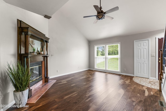 1900 Wolf Dr, La Grange, KY 40031 - unfurnished living room with wood finished floors, a glass covered fireplace, a ceiling fan, baseboards, and high vaulted ceiling