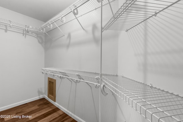 1900 Wolf Dr, La Grange, KY 40031 - walk in closet with dark wood-style flooring