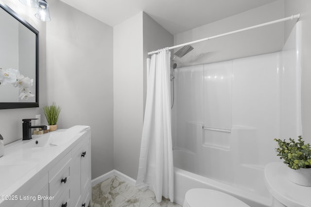 1900 Wolf Dr, La Grange, KY 40031 - bathroom with marble look tile flooring, toilet, shower / bath combination with curtain, baseboards, and vanity
