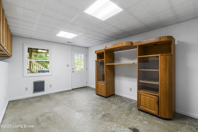 1900 Wolf Dr, La Grange, KY 40031 - unfurnished living room with unfinished concrete flooring and baseboards