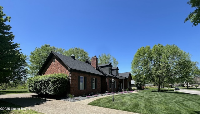 1609 Tall Oaks Dr, Jeffersonville, IN 47130 - view of property exterior with brick siding, a yard, and a chimney