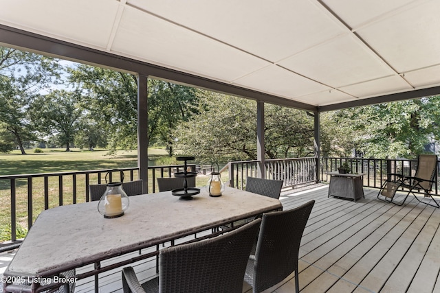 1609 Tall Oaks Dr, Jeffersonville, IN 47130 - deck featuring outdoor dining area, a lawn, and view of wooded area