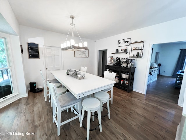 1609 Tall Oaks Dr, Jeffersonville, IN 47130 - dining room with a chandelier, dark wood-style floors, and baseboards