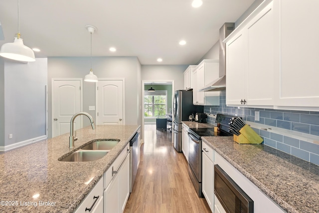 566 Wooded Falls Rd, Louisville, KY 40243 - kitchen with stainless steel appliances, a sink, white cabinetry, light wood finished floors, and tasteful backsplash