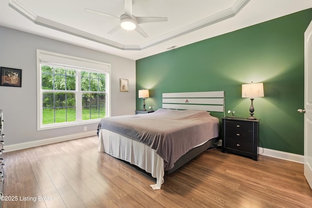 566 Wooded Falls Rd, Louisville, KY 40243 - bedroom with a raised ceiling, wood finished floors, baseboards, and ornamental molding