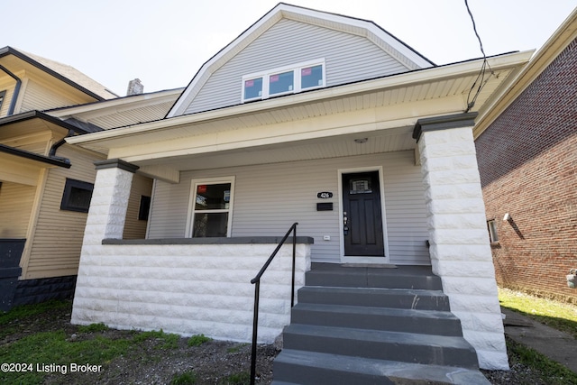 426 E Oak St, Louisville, KY 40203 - doorway to property with a porch