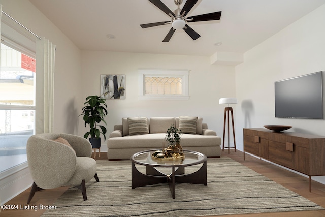426 E Oak St, Louisville, KY 40203 - living room featuring wood finished floors, ceiling fan, and baseboards